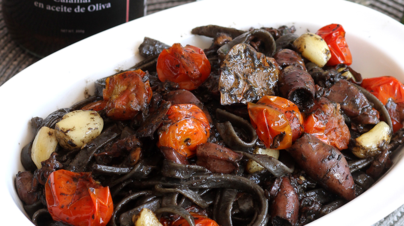 Squid Ink Linguine with Calamar en Aceita de Oliva with Roasted Garlic and Tomato